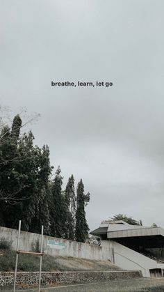 the words breathe, learn, let's go are written above an overcast sky