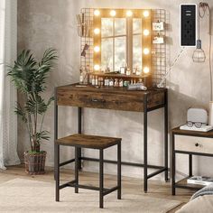 a vanity table with lights on it and a stool next to it in front of a mirror