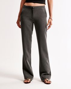 Elevate your wardrobe with the Abercrombie & Fitch Women's Low Rise Tailored Boot Pant, a perfect blend of sophistication and comfort. These pants are designed to flatter, featuring a low-rise cut and bootcut silhouette that enhances your figure.

- Size: 28 SHORT
- Color: Dark Gray
- Material: Pocket Bag - Polyester, Elastane
- Gender: Female
- Features: Slim waistband, functional pockets, zipper closure

Ideal for both office wear and casual outings, these pants offer a clean, tailored look wi Workwear Bottoms With Zip Fly And Straight Hem, Fitted Bottoms With Zip Fly And Straight Hem, Classic Mid-rise Pants With Zip Fly, Modern Straight Fit Bottoms With Straight Hem, Straight Fit Bottoms For Workwear, Tailored Bottoms For Workwear With Standard Cut Leg, Classic Business Casual Bottoms With Zip Fly, Classic Zip Fly Bottoms For Business Casual, Tailored Straight Bottoms With Pockets