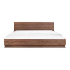 a wooden bed frame with white sheets and pillows on it's headboard, viewed from the side