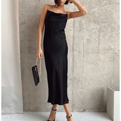 Black Silky Slip Dress With Adjustable Straps. Black Satin Slip Dress For Dinner, Black Maxi Slip Dress For Night Out, Black Satin Midi Dress For Dinner, Black Sleeveless Midi Dress For Dinner, Black Midi Slip Dress For Party, Black Sleeveless Slip Dress For Dinner, Sleeveless Black Slip Dress For Dinner, Black Dinner Dress For Summer, Elegant Black Slip Dress For Date Night