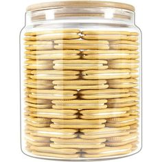 a glass jar filled with lots of cookies