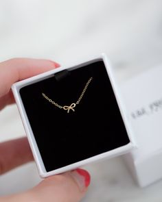 14k Gold Dainty Bow Necklace / Tiny Bow Necklace - Etsy Delicate Bow Jewelry As Gift, Delicate Bow Jewelry For Gift, Delicate Bow Jewelry For Gifts, Minimalist Gold Jewelry With Bow, Delicate Bow Necklace For Gifts, Gold Plated Bow Jewelry Gift, Gold Plated Bow Jewelry For Gift, Dainty Bow Necklace For Gift, Dainty Bow Necklace For Gifts