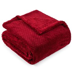 a red blanket folded on top of each other