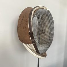 a hat that is sitting on top of a stand