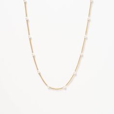 The Satellite Pearl Chain Necklace is a delicate and elegant piece of jewelry that is perfect for any occasion. Featuring a chain adorned with lustrous pearls, it has a minimalist design that exudes sophistication. Wear it alone or layer it with other necklaces to create a unique look that reflects your personal style. Minimalist Pearl Chain Necklace For Layering, Minimalist Layering Pearl Chain Necklace, Minimalist Gold Pearl Necklace With Chain, White Chain Necklace With Pearl Pendant For Layering, Delicate Pearl Chain Necklace For Layering, Minimalist White Chain Necklace With Delicate Chain, Minimalist White Delicate Chain Necklace, Elegant Pearl Necklace With Adjustable Chain For Layering, Minimalist Pearl White Pearl Chain Necklace