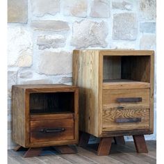 two wooden nightstands sitting next to each other