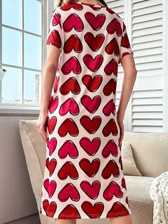 Stay warm and stylish with our Heart Print Nightdress, the perfect pajama for cozy nights. This nightdress features a heart print design, ensuring a comfortable and cute fit. Made with soft and luxurious material, it's the ideal choice for a good night's sleep. Color : Multicolor Style : Casual-Young Pattern Type : Heart Pattern Type : All Over Print Type : Sleepshirts Neckline : Round Neck Sleeve Length : Short Sleeve Sleeve Type : Drop Shoulder Length : Midi Fit Type : Loose Fabric : Slight Stretch Material : Knitted Fabric Composition : 95% Polyester Composition : 5% Elastane Care Instructions : Machine wash or professional dry clean Sheer : No Size US Bust Cuff Length Shoulder Sleeve Length S 4 104 37 112 45 17 M 6 108 38.4 114 46 17.6 L 8/10 114 40.6 116 47 18.3 XL 12 120 42.8 118 48 Pink Heart Print Sleepwear For Pajama Party, Pink Sleepwear For Valentine's Day, Pink Valentine's Day Sleepwear, Pink Sleepwear For Valentine's Day Pajama Party, Casual Heart Print Sleepwear For Sleepover, Casual Sleepwear With Heart Print For Sleepovers, Casual Sleepwear For Valentine's Pajama Party, Casual Valentine's Day Sleepwear For Pajama Party, Casual Short Sleeve Sleepwear With Heart Print