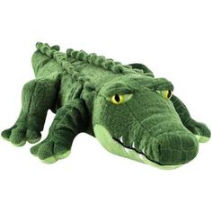 an alligator stuffed animal laying on top of a white background