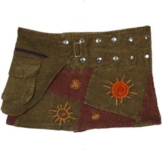 A handmade 12 inches short mini skirt in an earthy patchwork of green and brown with helio embroidery. The snap button wrap has a fanny pack on the waist - useful for carrying small items - from keys and cash to credit card. #tlb #WrapAroundSkirt #Pocket #Patchwork #hippieskirt