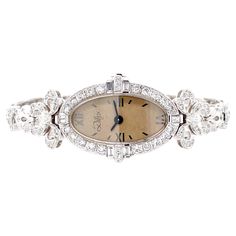 Inspired by the Art Deco movement, Dilys’ exceptional Swiss quartz movement diamond watch in 18 karat gold exhibits beautiful intricacy with detailed cutouts and outlines throughout. This timepiece speaks for itself and is a work of wearable art. The 18 karat white gold dial is set with 159 brilliant-cut, marquise and baguette diamonds, totaling 1.81 carats, while the watch face is made out of sapphire crystal. Fine jewellery watches are a passion project at the House of Dilys’ in Hong Kong, whe Luxury Vintage Diamond Watch For Formal Occasions, Luxury Vintage Watches With Quartz Movement, Art Deco Movement, Baguette Diamonds, Passion Project, Women Diamond, Art Deco Inspired, Diamond Watch, Baguette Diamond