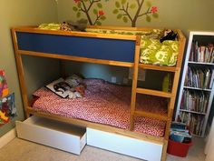 the bunk bed is made up and ready to be used as a child's room