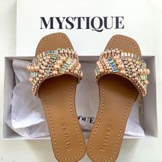 Mystique Crystal And Pearl Embellished Slides/Sandals. Brand New Size 8 Tan Color, Real Leather, With Pink And Yellow Crystals And Pearls Really Well Done An High Quality Shoes!, Comes From Miami Area. Chic Beaded Open Toe Sandals, Chic Embellished Beige Sandals, Chic Beige Embellished Sandals, Embellished Closed Toe Sandals For Summer, Summer Embellished Closed Toe Sandals, Embellished Flat Beige Sandals, Brown Embellished Sandals For Party, Brown Embellished Party Sandals, Party Brown Embellished Sandals