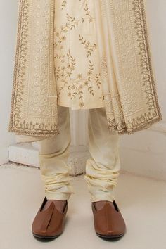 Beige raw silk sherwani with floral zardosi embroidery. Paired with a kurta and churidar. - Aza Fashions Bollywood Art Silk Sherwani With Chikankari Embroidery, Traditional Chanderi Sherwani With Naqshi, Designer Art Silk Sherwani With Chikankari Embroidery, Elegant Chanderi Sherwani For Ceremonial Occasions, Traditional Bandhgala With Chikankari Embroidery In Art Silk, Festival Chanderi Bandhgala For Reception, Art Silk Sherwani With Chikankari Embroidery, Straight Kurta, Traditional Drape Chanderi Bandhgala With Dabka, Raw Silk Churidar With Chikankari Embroidery For Reception