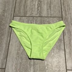 Xhiliration Xtra Small Bikini Lime Green Shell Is 78% Nylon 22% Spandex Lining Is 100% Polyester Handwashcold With Likecolors Only Non-Chlorine Bleach If Needed Line Dry, Do Not Iron Green Stretch Bottoms For Beach Party, Stretch Green Bottoms For Beach Party, Green Stretch Tankini For Sports, Trendy Stretch Swimwear For Swimming, Green Stretch Nylon Swimwear, Green Stretch Nylon Tankini, Trendy Stretch Swimwear For Poolside, Green Nylon Brief Swimwear, Trendy Fitted Swim Briefs