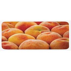 a pile of peaches sitting on top of each other