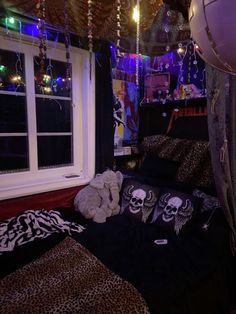 a bedroom decorated for halloween with decorations and lights