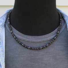 "Stunning men's necklace featuring 6mm black onyx, matte black onyx and lava beads, all genuine and high quality gemstones. They are strung on the highest quality stainless steel beading wire for maximum strength and flexibility, and finished with a stainless steel lobster clasp. Lengths available range from 18\" to 26\". See size chart in last image. Materials: 6mm matte black onyx 6mm black onyx 6mm black lava Stainless steel beading wire Stainless steel lobster clasp We use only the best qual Mens Choker Necklace, Beaded Necklace Black, Sandalwood Bracelet, Holly Springs Nc, Mens Beaded Necklaces, Hematite Necklace, Black Onyx Necklace, Chakra Necklace, Wood Bead Necklace