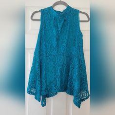 Nwt (Tag Intact) Beautiful Teal Lace Sleeveless Flare Blouse Asymmetrical Bottom Teal Lining 16" Armpit To Armpit 2 Buttons Back Of Neck *Color May Vary Due To Lighting Smoke Free Home Spring Vest Tops With Asymmetrical Hem, Sleeveless Lace Top Blouse For Parties, White Boho Blouse, Blue Shirt Women, Long Sleeve Peplum Top, Flare Blouse, White Lace Shirt, Yellow Floral Blouse, Teal Shirt