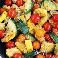 zucchini, cherry tomatoes and cucumber salad with parmesan cheese