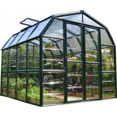 a green house with many plants growing inside