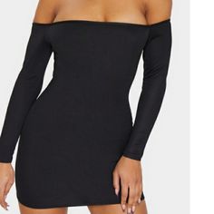 Black Lycra Dress, With Long Sleeves And Bare Shoulders, Sleek Solid Color Club Dress, Black Strapless Bodycon Dress For Spring, Flirty Stretch Mini Dress For Night Out, Black Bodycon Dress For Club, Black Bodycon Club Dress, Sleek Black Bodycon Dress For Going Out, Sleek Black Mini Dress, Black Mini Length Bodycon Dress For Club, Strapless Black Bodycon Dress For Going Out