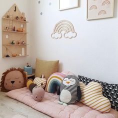 a child's room with stuffed animals and toys