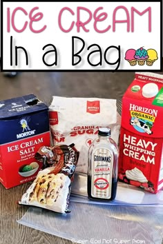 ice cream in a bag is sitting on the table next to some cookies and milk