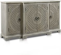 the sideboard is made out of wood and has intricate carvings on it, as well as metal handles