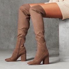 Beautiful Sophisticated Over-The-Knee Fabric Boot. Color Tan Upper: Fabric Design: Over-The-Knee Tall Boot Toe Type: Closed, Round Closure: Zipper Insole: Padded Sole: Rubber Measurements Heel Height: Approx. 2-1/2"H Self-Covered Heel Shaft: Approx. 22"H With 16" Leg Opening Imported Elegant Beige Knee-high Boots For Fall, Fitted Suede Knee-high Boots With Block Heel, Beige Fitted Suede Knee-high Boots, Elegant Brown Thigh High Heeled Boots, Brown Fitted Knee-high Boots With Block Heel, Fitted Brown Knee-high Boots With Block Heel, Elegant Suede Knee-high Boots For Spring, Fabric Boots, How To Stretch Shoes