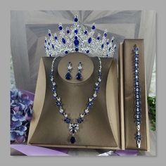 a blue and white tiara set in a box