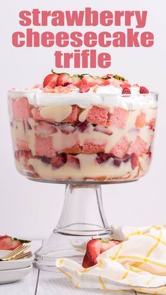 strawberry cheesecake trifle in a glass dish with strawberries on top and the title overlay reads, strawberry cheesecake trifle