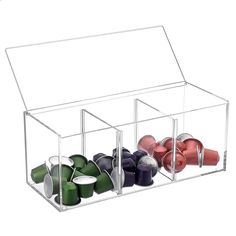 a clear container with cups and saucers in it on a white background for storage