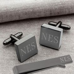 "This is the ultimate wedding day gift set for your groomsmen, best man and groom. The handsome set features a pair of square gunmetal cufflinks and a matching gunmetal tie clip. Each piece can be engraved with the recipient's initials making a special gift that can be used more than just once! - FREE SHIPPING - FREE PERSONALIZATION - Stainless steel construction with gunmetal coating. - Each set arrives in padded black gift box. - Cufflinks measure 5/8\" (diameter) by 1\" in length and have tra Monogrammed Cuff, Groomsmen Cufflinks, Groomsmen Gifts Unique, Monogrammed Cufflinks, Initial Cufflinks, Groomsmen Gift Box, Engraved Cufflinks, Custom Cufflinks, Groomsmen Gifts Personalized