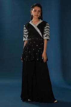 Black short angrakha with resham,dabka,sequins and white pearl embroidery. Paired with coordinating sharara. - Aza Fashions Black Angrakha, Sharara For Women, Women Kurta, Pearl Embroidery, Silk Embroidery, White Pearl, Aza Fashion, Black Shorts, Pearl White