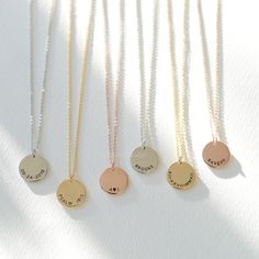 "Personalized message round disc necklace: This beautiful disc necklace would make a perfect personalized gift for yourself or your loved ones. The perfect layering necklace or beautiful on its own. Options to personalize this disc with: - Initials - Quote - Names - Special Dates - Roman Numerals - Coordinates of your meaningful places - Other types of text and numbers... D E T A I L S - Disc size: 15mm, good thickness - Engraved personalization of your choice - This listing is for one single ne Hand Stamped Round Disc Necklaces For Mother's Day, Hand Stamped Round Disc Necklace For Mother's Day, Meaningful Adjustable Round Charm Necklace, Meaningful Adjustable Round Charm Necklaces, Meaningful Adjustable Charm Necklaces, Engraved Round Charm Necklace For Best Friend, Personalized Round Charm Necklaces For Best Friend, Dainty Engraved Round Disc Charm Necklaces, Rose Gold Hand Stamped Charm Necklaces With Round Shape