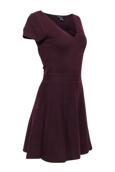 This elegant knit dress by Theory is a wardrobe maker. Comfort meets a flattering fit to create this go-anywhere piece. Whether getting dressed for work, gathering with friends, or a special event, the fit and flare silhouette helps you enter the room in style and confidence! Size M 94% Wool, 6% Elastane Fit & flare silhouette V-neckline Knee-length Wide ribbed knit skirt Bust 32" Waist 27" Shoulder to hem 36.5" Sleeve length 6" Chic A-line Knit Dress, Fitted Viscose V-neck Mini Dress, Elegant Short Sleeve Knit Dress, Chic Fitted A-line Sweater Dress, Fitted Knee-length Knit Midi Dress, Fitted Knit Evening Dress, Fitted Knit Dress For Evening, Evening Fitted Knit Sweater Dress, Elegant Knit Midi Dress For Work