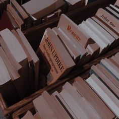 many wooden boxes stacked on top of each other