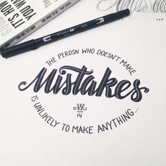 a pen and some type of writing on top of a piece of paper with the words, the person who doesn't make mistakes is always to make anything