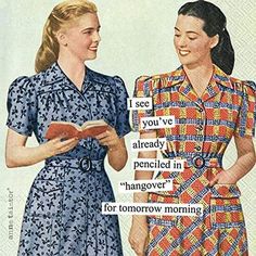 two women standing next to each other in dresses