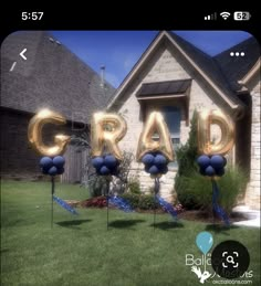 balloons that spell out the word crap in front of a house