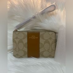 Coach Wristlet Brand New With Tags Ships Next Day Perfect For Gift 100% Original Packaging Beige Clutch With Wrist Strap For Gift, Beige Clutch With Wrist Strap As Gift, Beige Rectangular Clutch With Wrist Strap, Trendy Brown Rectangular Wristlet, Coach Beige Pouch Wristlet, Beige Coach Pouch Wristlet, Beige Wristlet Clutch With Zipper Closure, Beige Clutch Wristlet With Zipper, Beige Zipper Closure Wristlet Clutch