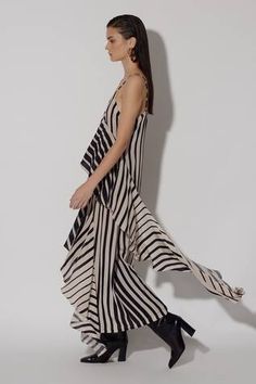 Black sleeveless dress with stripe print and ruffle draped panel. - Aza Fashions Sleeveless Vertical Stripes Maxi Dress, Chic Striped V-neck Dress, Panelled Dress, Casual Striped V-neck Sleeveless Dress, Vertical Stripes V-neck Vacation Dresses, Sanya Malhotra, Jacqueline Fernandez, Black Zebra Print V-neck Dress, Panel Dress