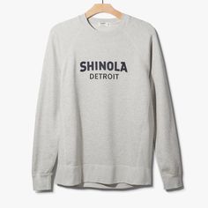 Crafted from 100% cotton and sewn locally by Soft Goods Detroit, the Shinola Logo Sweatshirt takes casual to a new level of quality. Featuring the classic Shinola Detroit logo and raglan sleeves for a comfortable fit, this lightweight French Terry sweatshirt is ultra-soft and makes for the perfect layering staple in your wardrobe. Designed to be a slim unisex fit, we recommend sizing up if in-between sizes. Detroit Logo, Shinola Detroit, Lifestyle Clothing, Grey Sweatshirt, Active Wear For Women, French Terry, Heather Grey, Print T Shirt, Graphic Sweatshirt