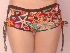 a close up of a woman's panties with beading on the bottom and side