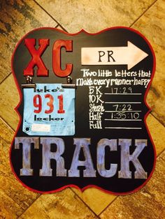 a sign that says xc and has been altered to look like it is on the wall