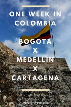 a flag flying on top of a stone wall with the words one week in colombia and medelli x cartagena