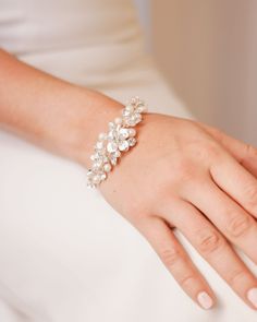 a close up of a person wearing a bracelet