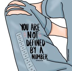 a person wrapped in a blanket with the words you are not defined by a number on it