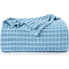 the blue blanket is folded on top of it